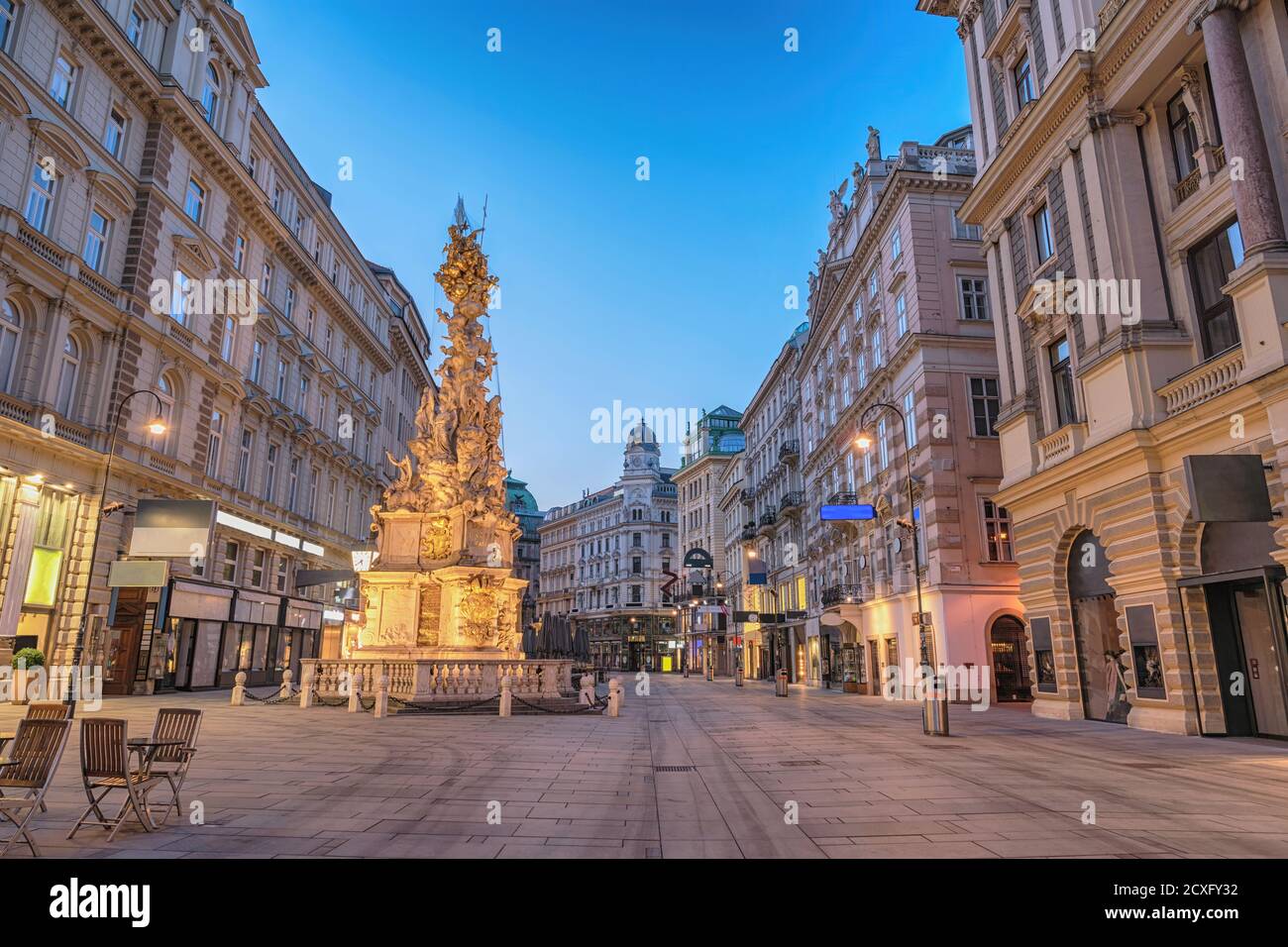 Vienna Austria night city skyline at Vienna Plague column or Pestsaule Stock Photo