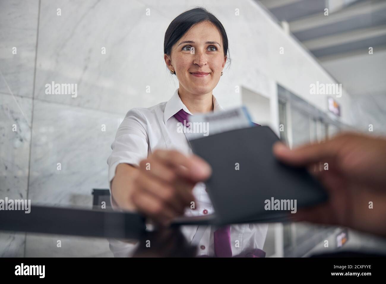 Airport checking id hi-res stock photography and images - Alamy