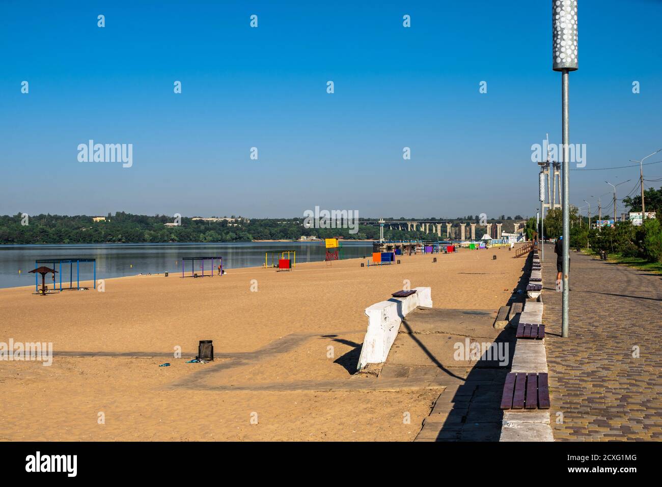 Zaporozhye, Ukraine 07.21.2020. Public beach on the banks of the Dnieper in Zaporozhye, Ukraine, on a sunny summer morning Stock Photo