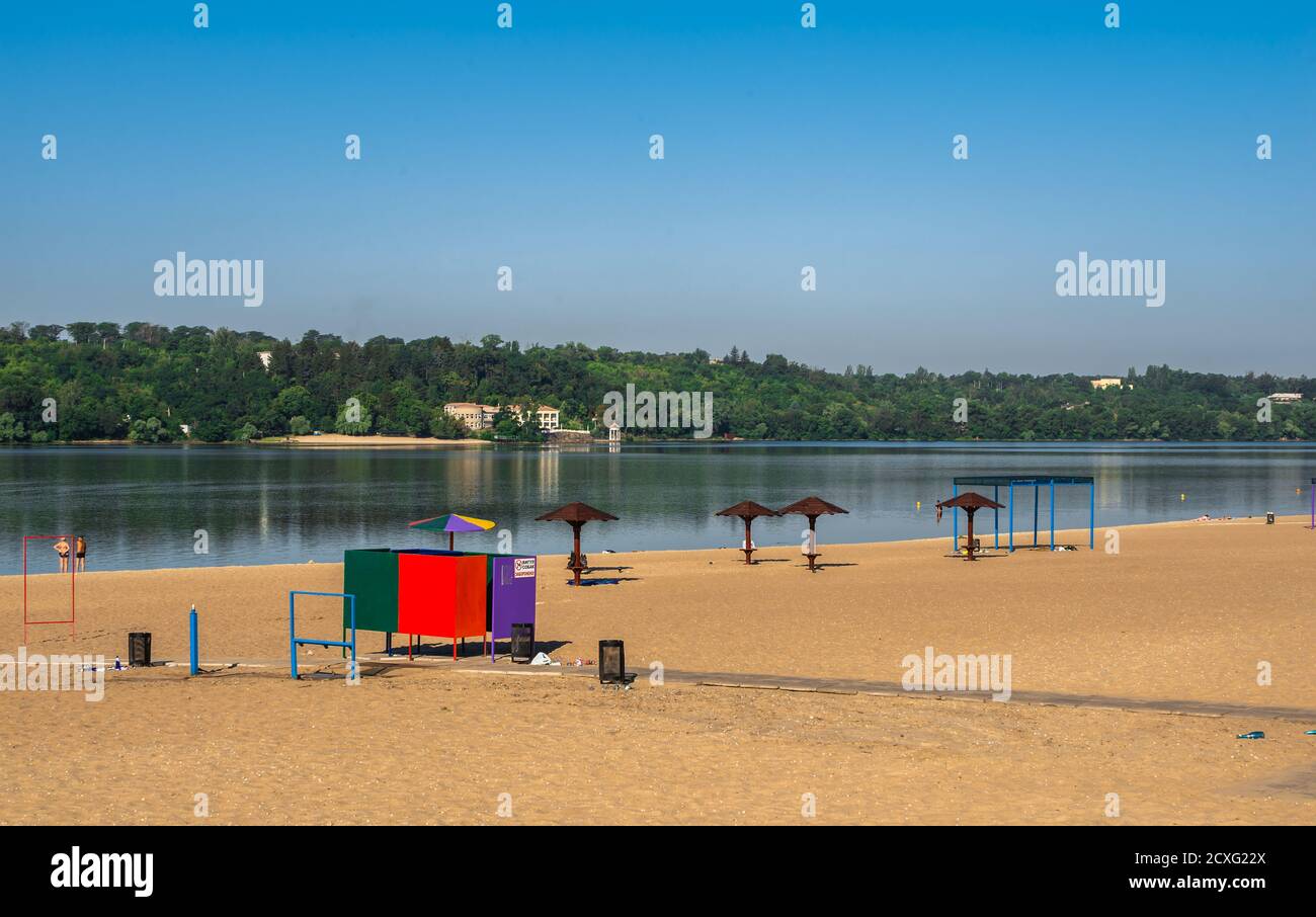 Zaporozhye, Ukraine 07.21.2020. Public beach on the banks of the Dnieper in Zaporozhye, Ukraine, on a sunny summer morning Stock Photo