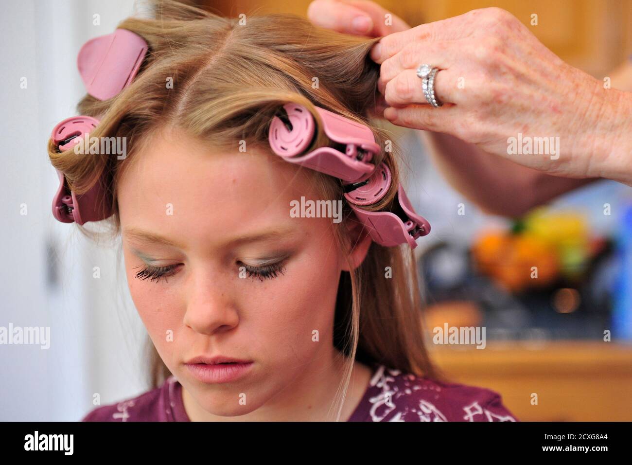 Rachel Shirah 11 Has Her Hair Curled By Her Mother Beth On The Morning Of The 52nd Miss And Little Miss Silver Spurs Pageant At Her Family S Ranch In St Cloud Florida