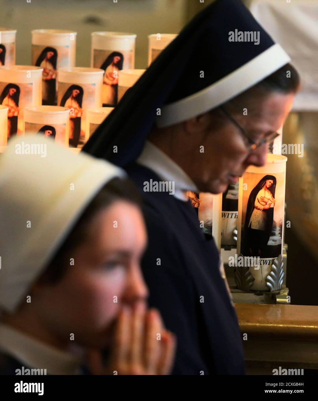 The faithful pray at the shrine of Kateri Tekakwitha in St. Francis