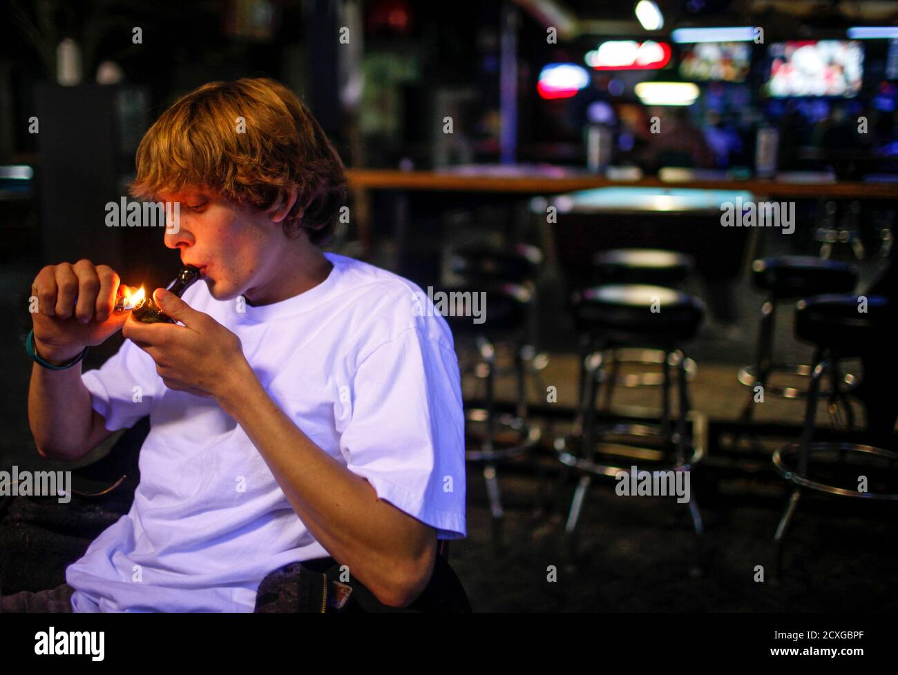 Russell Diercks Smokes Marijuana Inside Of Frankie Sports Bar And Grill In Olympia Washington On December 9 12 The Owner Frank Schnarr Who Waged An Ultimately Successful Battle With Local And State Russell Diercks Smokes Marijuana Inside Of Frankie Sports Bar And Grill In Olympia Washington On December 9 12 The Owner Frank Schnarr Who Waged An Ultimately Successful Battle With Local And State