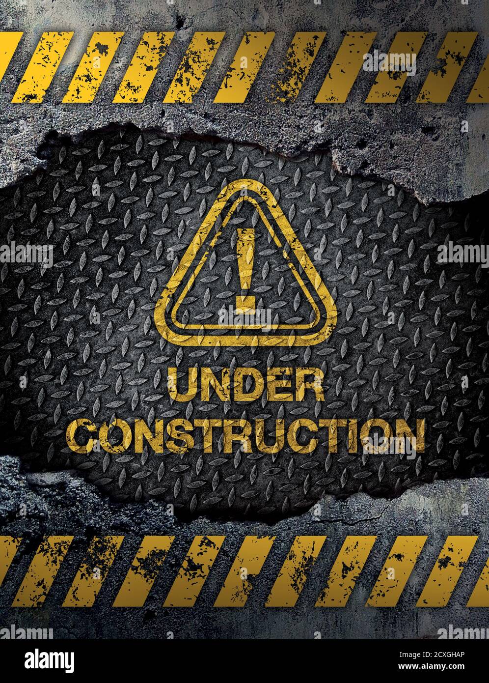 Under construction sign on rusty metal background Stock Photo