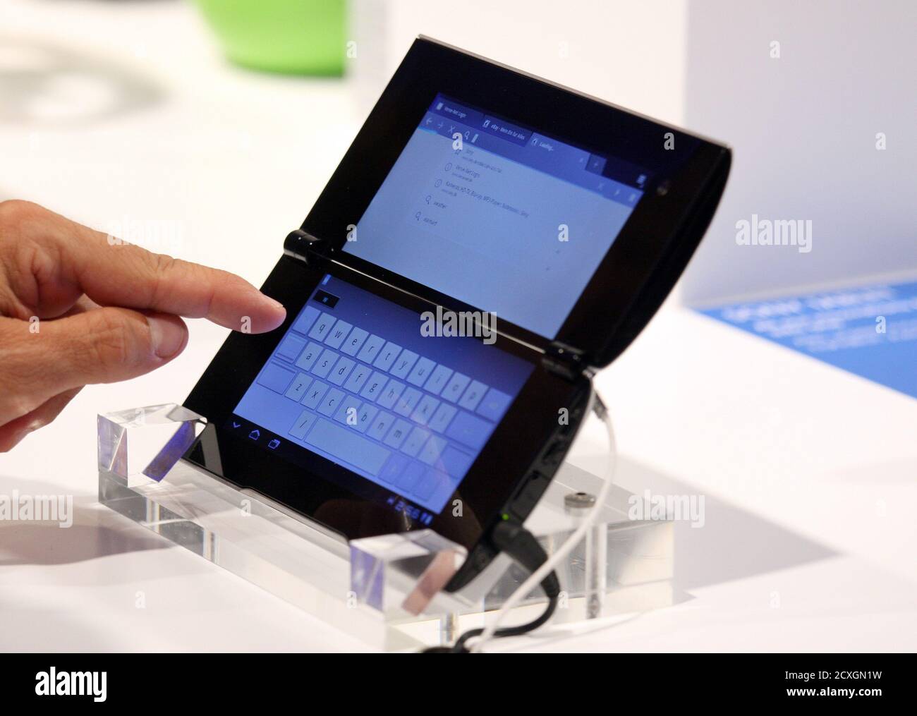 https www alamy com a member of the media looks at the new sony p tablet at the ifa consumer electronics fair in berlin august 31 2011sony corp took the wraps off its long awaited tablets on wednesday with price tags that could hurt the companys chances to compete for the no 2 spot in the tablet market in europe the s tablet will cost 479 euros and will be in stores in september sony said the s tablet is unique because of a universal remote inside the computer that can be used to control stereos cable television boxes and tv sets of many brands the p tablet comes with 4 gb of memory and looks like a clut image377766533 html