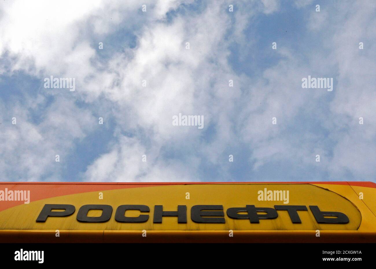 The company logo at a Rosneft petrol station in St.Petersburg October 23, 2012. Russian oil company Rosneft tightened its grip on Russia's oil industry on Monday with a $55 billion deal to buy TNK-BP that also makes Britain's BP a one-fifth shareholder in the state-controlled company.  REUTERS/Alexander Demianchuk (RUSSIA - Tags: BUSINESS ENERGY LOGO) Stock Photo