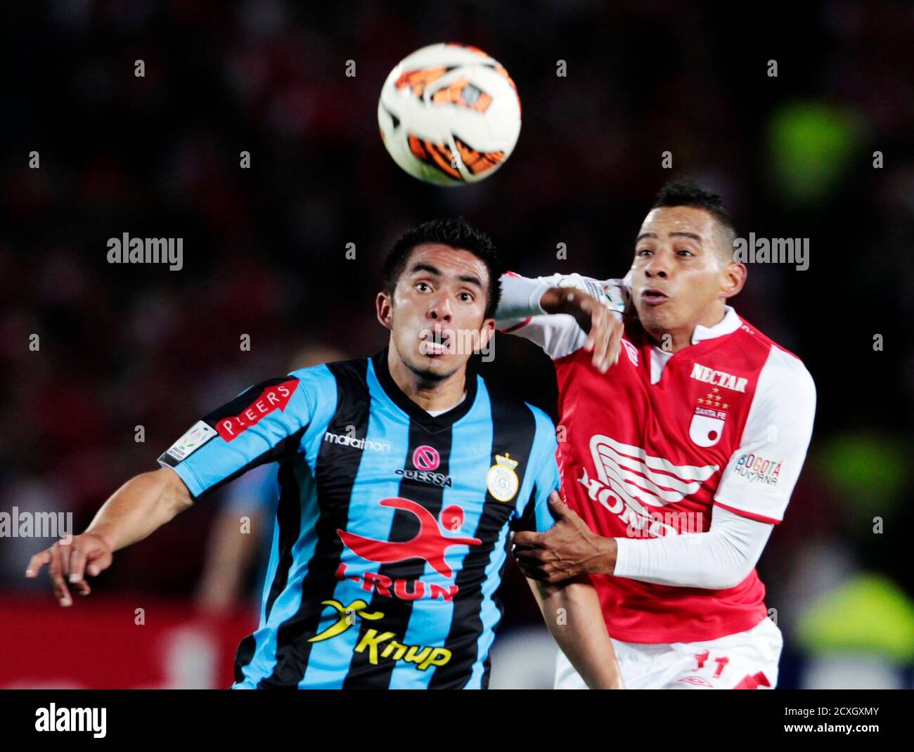 Wilder Medina R Of Colombia S Santa Fe And Juan Lojas Of Peru S Real Garcilaso Battle For The Ball During Their Copa Libertadores Soccer Match In Bogota May 28 13 Reuters Jose Miguel Gomez Wilder Medina R Of Colombia S Santa Fe And Juan Lojas Of Peru S Real Garcilaso Battle For The Ball During Their Copa Libertadores Soccer Match In Bogota May 28 13 Reuters Jose Miguel Gomez