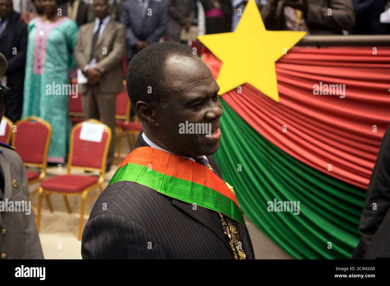 Burkina Faso's President Michel Kafondo is seen after being sworn into his post for the transitional period of one year, in Ouagadougou November 21, 2014. Kafando was chosen by a committee on Monday set up after former president Blaise Compaore resigned and fled on October 31 in the face of mass protests against his attempt to change the constitution and extend his 27-year rule. Kafondo is faced with the task of leading the West African country to elections in a year following a brief military takeover.    REUTERS/Joe Penney (BURKINA FASO - Tags: POLITICS) Stock Photo