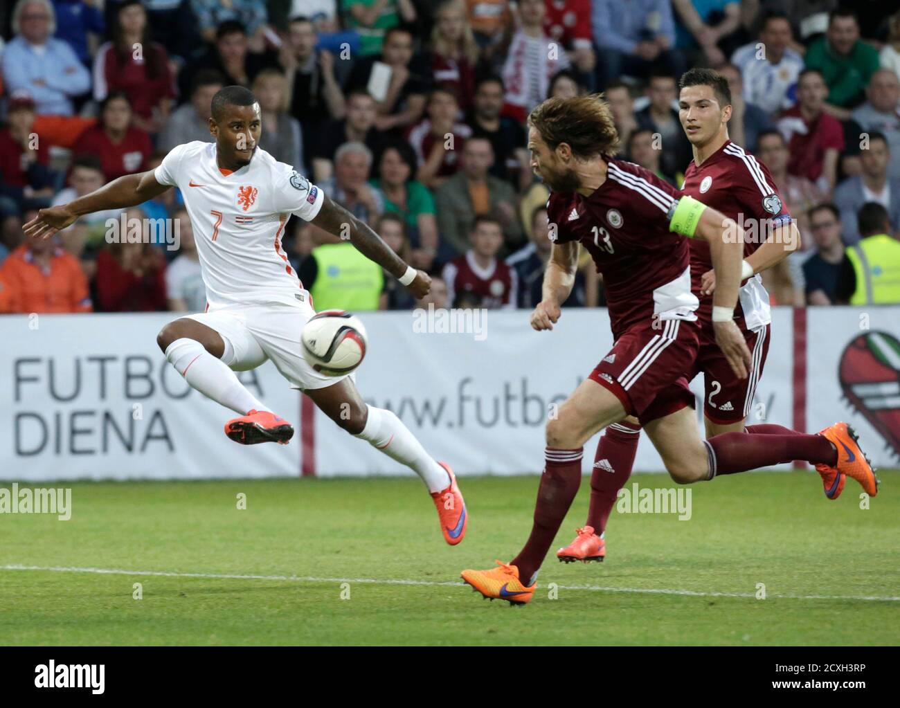 Netherlands Luciano Narsingh L Fights For Ball With Latvia S Kaspars Gorks C And Vitalijs Maksimenko R During Their Soccer Euro 16 Qualification Match In Skonto Stadium In Riga Latvia June 12 15