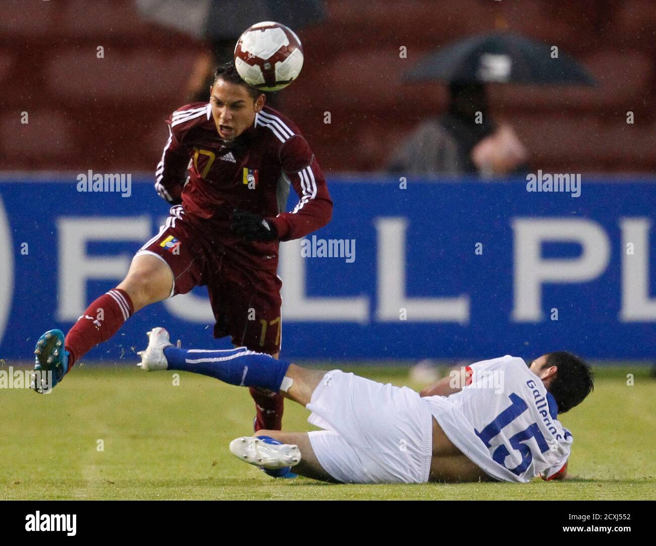 Venezuela S Jose Mesa L Drives Past Chile S Luis Felipe Gallegos During Their Group A Soccer Match