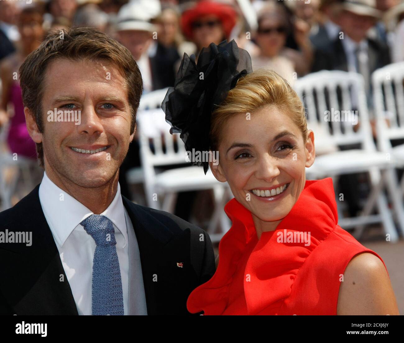 prince-emanuele-filiberto-of-savoy-l-and-his-wife-french-actress-clotilde-courau-arrive-at-the-place-du-palais-to-attend-the-religious-wedding-ceremony-for-monacos-prince-albert-ii-and-princess-charlene-at-the-palace-in-monaco-july-2-2011-reutersmichel-spinglerpool-monaco-tags-royals-entertainment-monaco-royal-wedding-2CXJ6JY.jpg