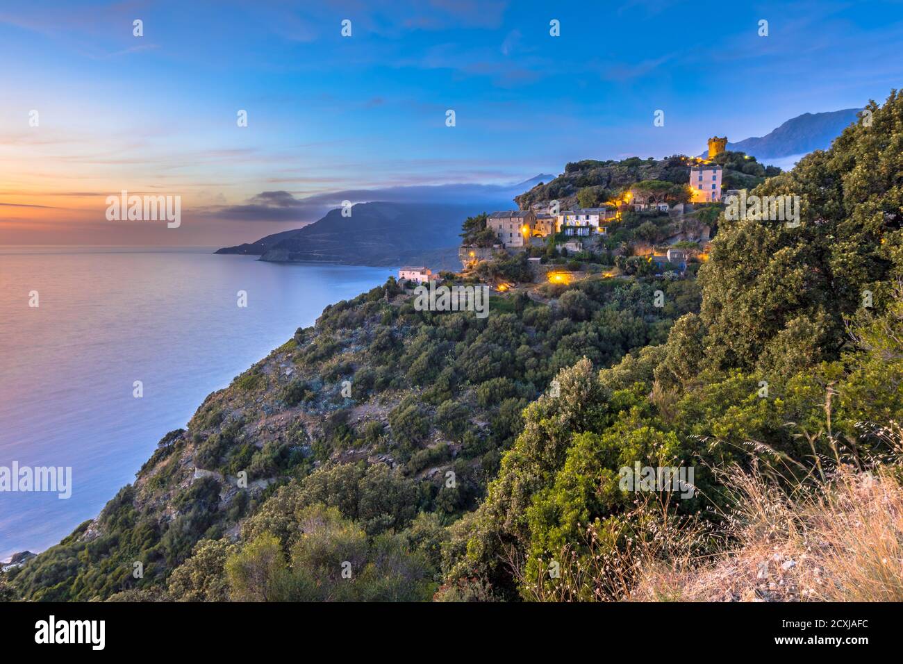 Mountain Village of Nonza with view over the mediteranean sea on Cap corse, Corsica, France Stock Photo