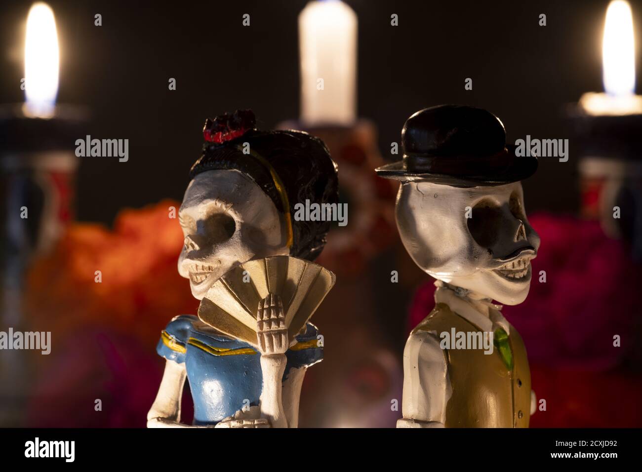 Closeup shot of two skeleton figurines for an offering of the day of the dead Stock Photo