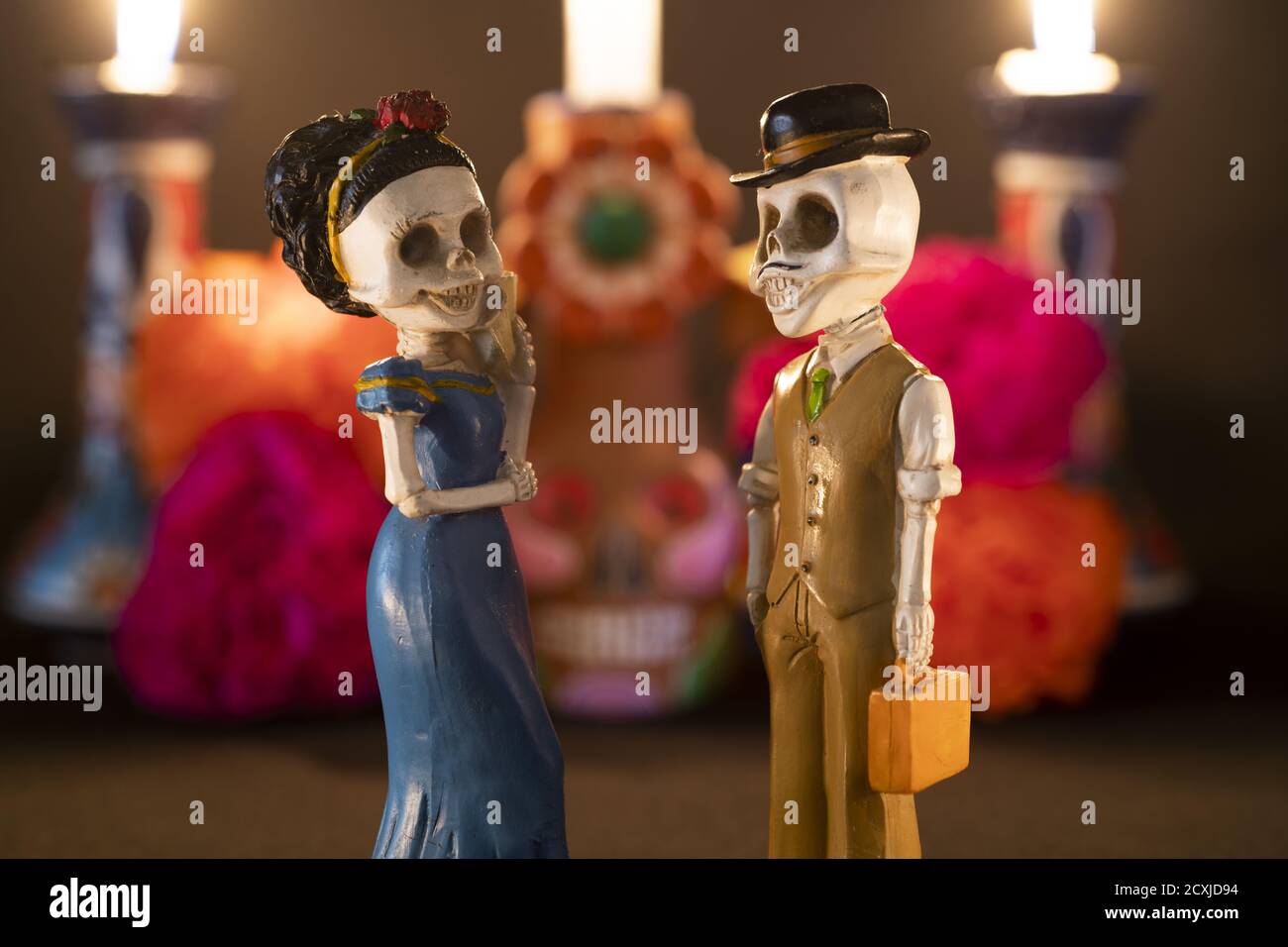 Closeup shot of two skeleton figurines for an offering of the day of the dead Stock Photo