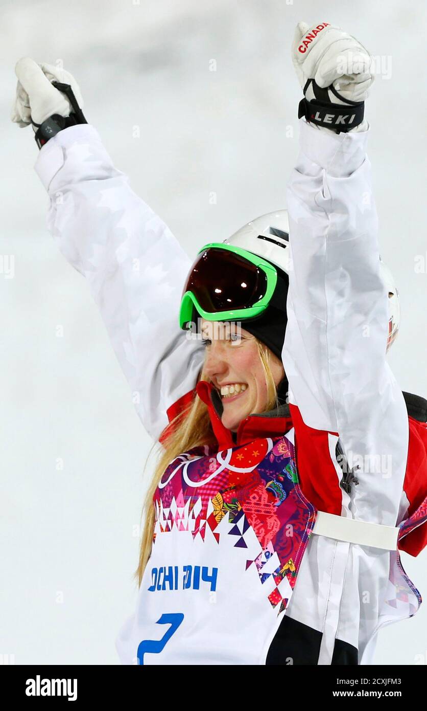 Winner Justine Dufour-Lapointe of Canada celebrates on the podium