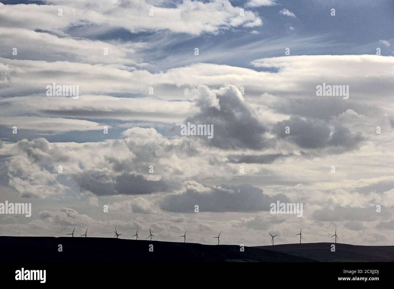Clouds above Coal Clough wind farm, Burnley, Lancashire Stock Photo