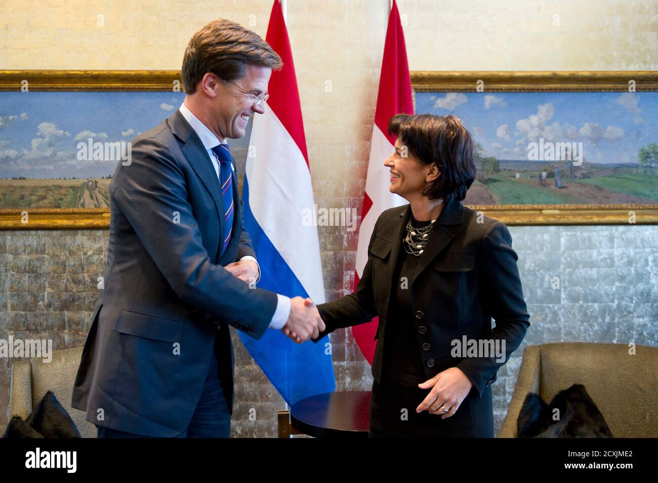 Swiss President Doris Leuthard (R) welcomes Netherland's Prime Minister  Mark Rutte for a meeting in the 'Private Dining Room' in a hotel in Zurich  December 2, 2010. REUTERS/Ennio Leanza/POOL (SWITZERLAND) 'THIS IMAGE