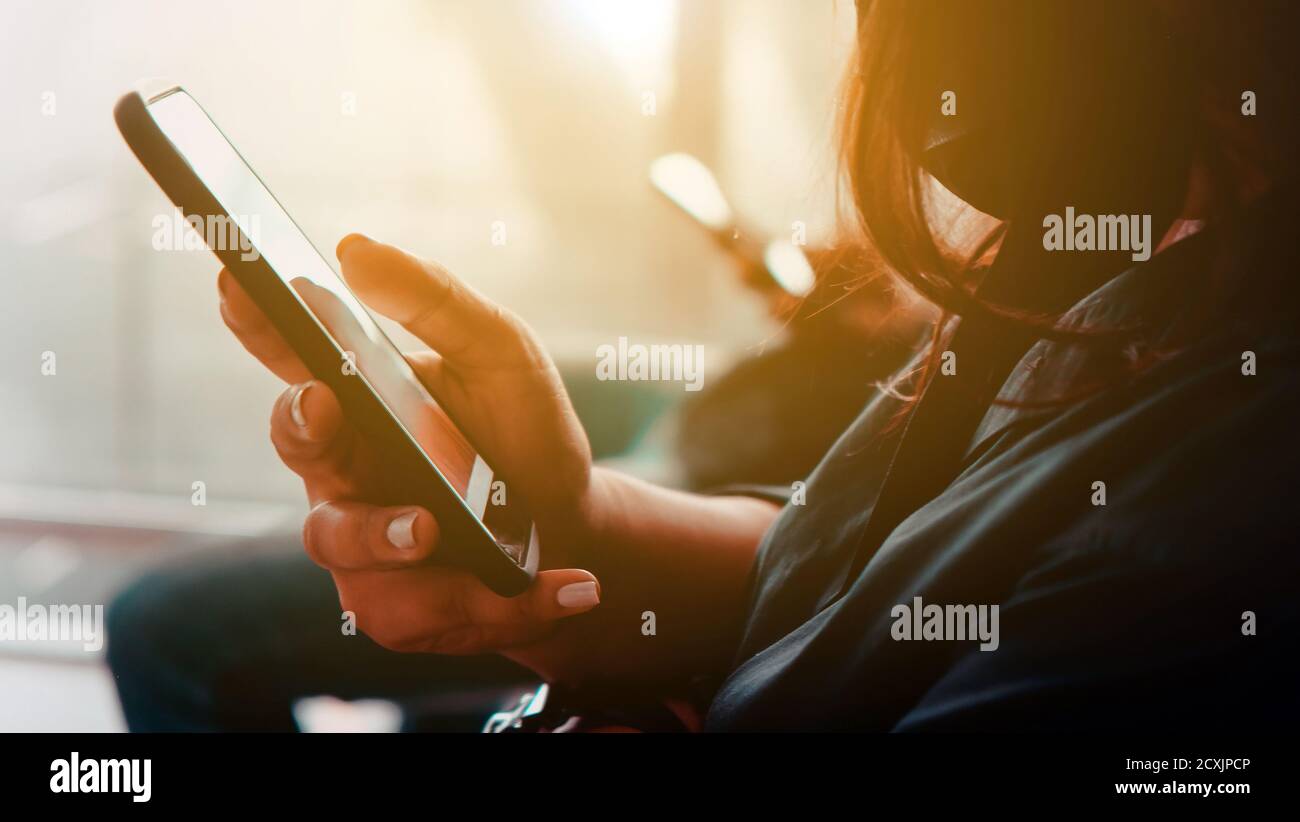 Women hand holding smart hi-res stock photography and images - Alamy