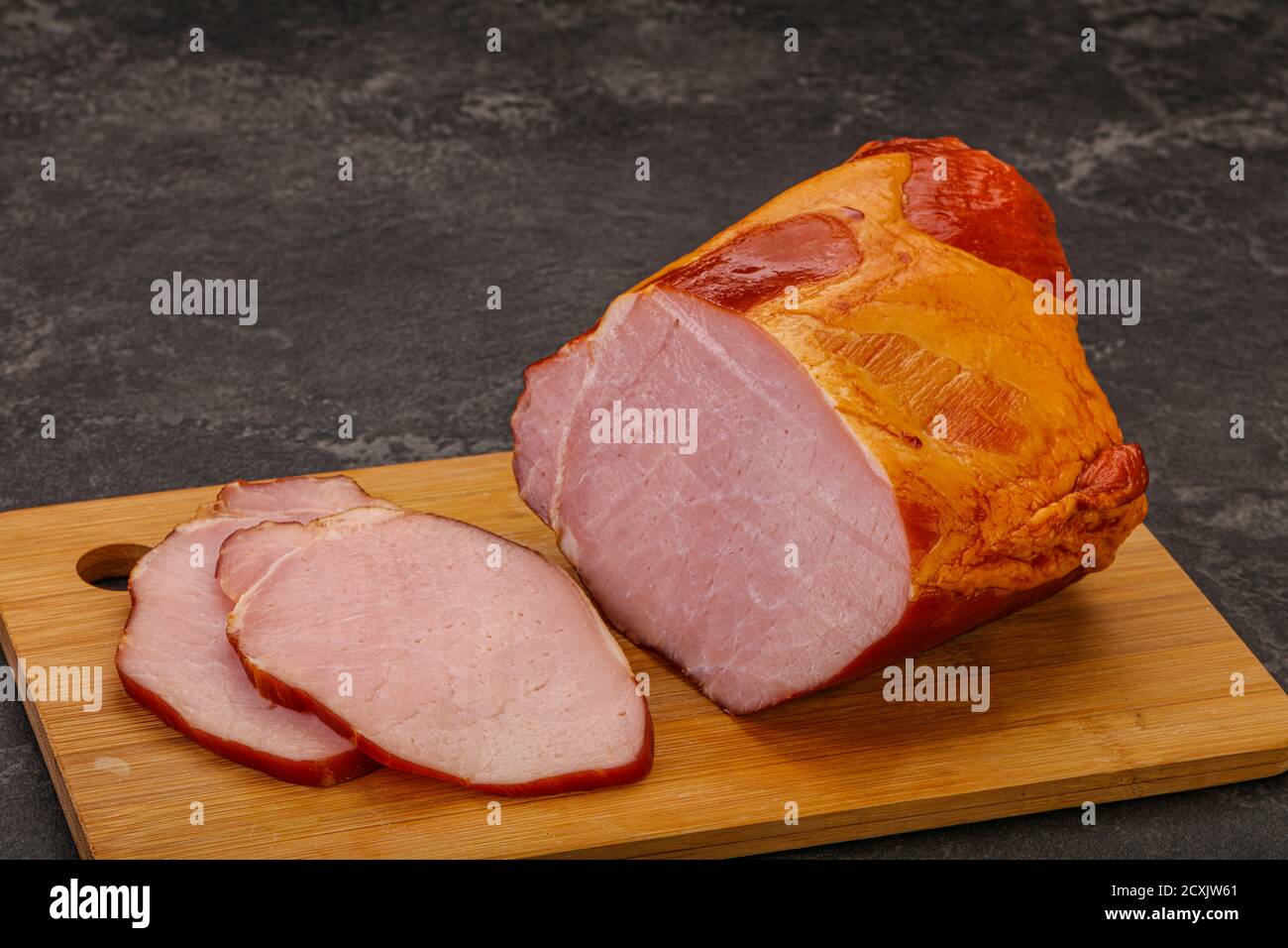 Smoked pork lion with spices and herbs Stock Photo - Alamy