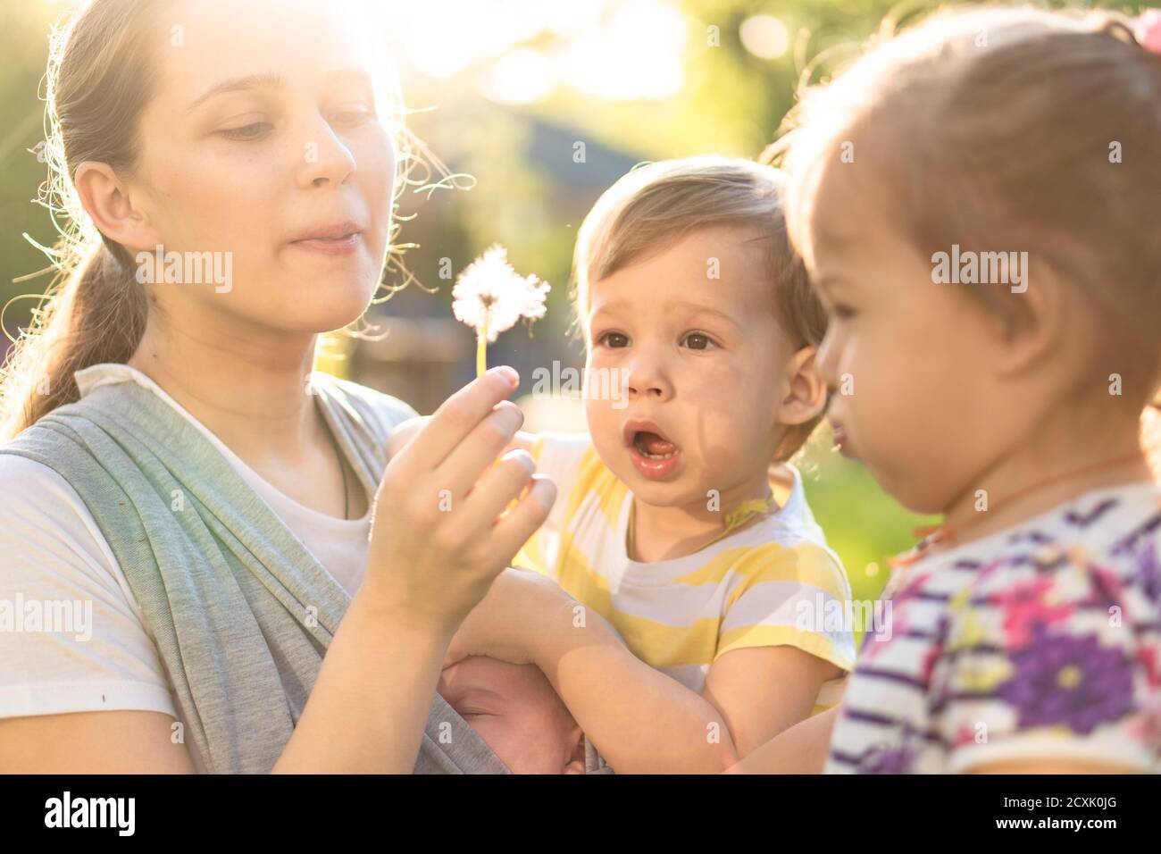 Motherhood, care, infants, summer, childhood and large families concept