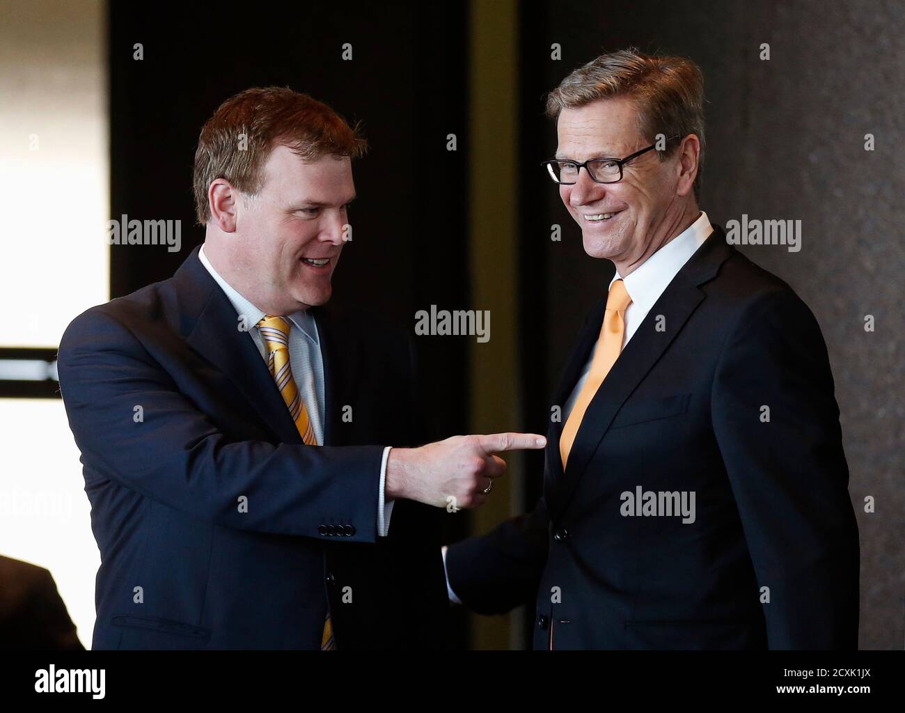 Canada's Foreign Minister John Baird (L) greets his German counterpart Guido Westerwelle at the Lester B. Pearson Building in Ottawa May 30, 2013. REUTERS/Chris Wattie (CANADA - Tags: POLITICS) Stock Photo