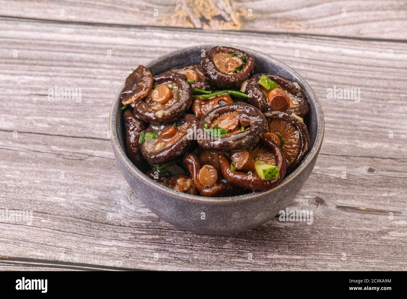 Marinated shiitake mushrooms with herbs and spices Stock Photo Alamy
