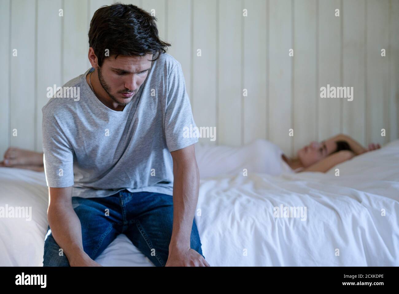 Young couple having relationship difficulties in the bedroom Stock Photo