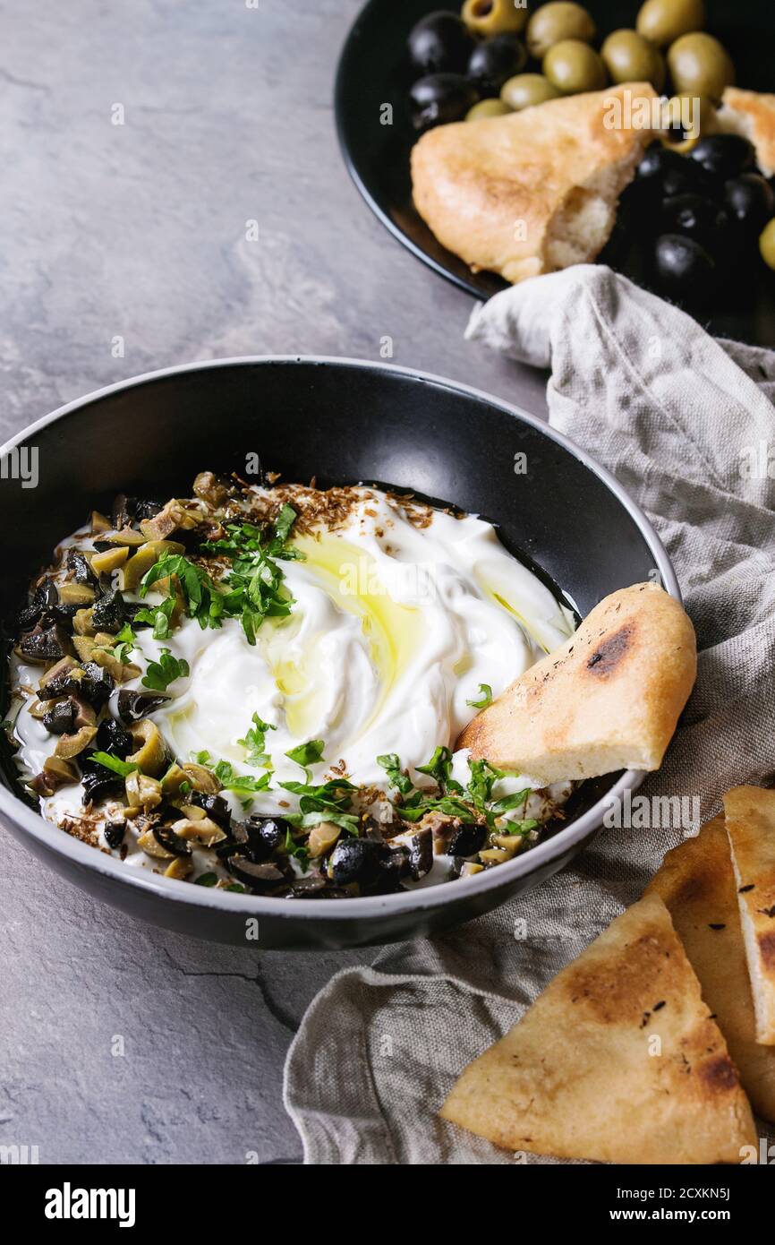 labneh middle eastern lebanese cream cheese dip with olive oil, salt