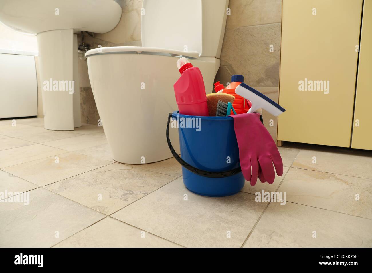 Bucket with cleaning products in modern bathroom Stock Photo Alamy