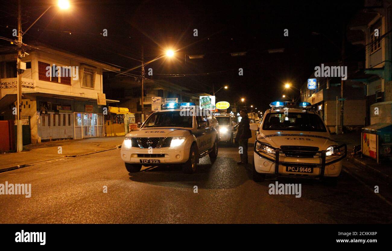 Police Units Stop Abreast Of Each Other Along The Western Main Road In St James About 4 Km 2 5 Miles West Of The Capital Port Of Spain August 23 2011 The Popular