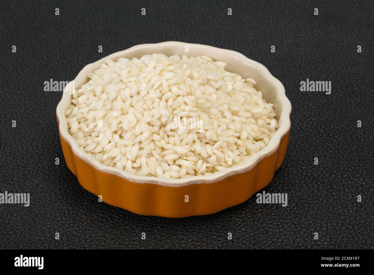 Raw Arborio rice for Italian risotto Stock Photo Alamy