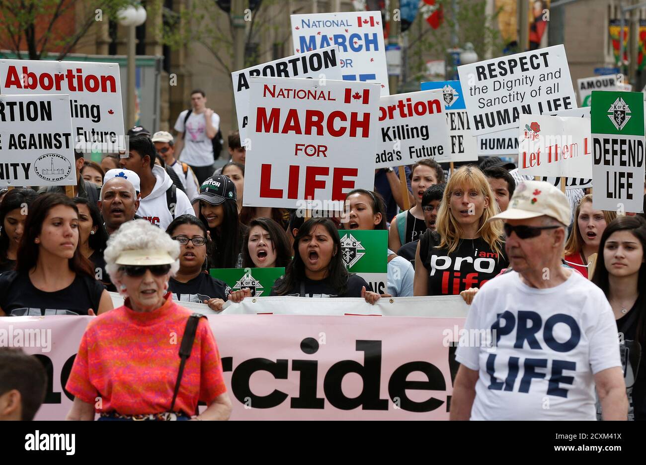 Anti-abortion protesters take part in the National March for Life in Ottawa May 9, 2013.  REUTERS/Chris Wattie (CANADA - Tags: CIVIL UNREST POLITICS) Stock Photo