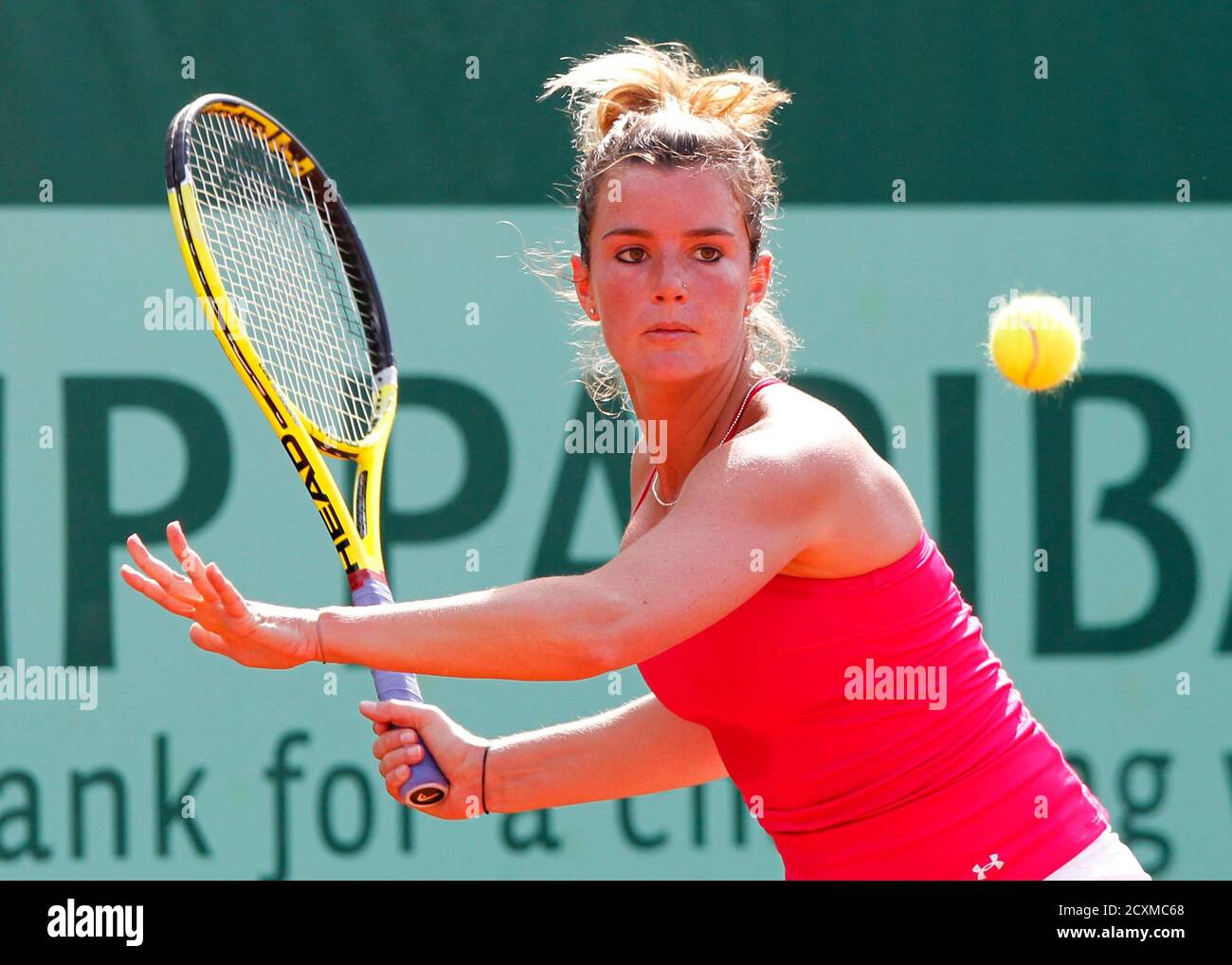 Olivia Sanchez of France returns to Polona Hercog of Slovenia during the  French Open tennis tournament