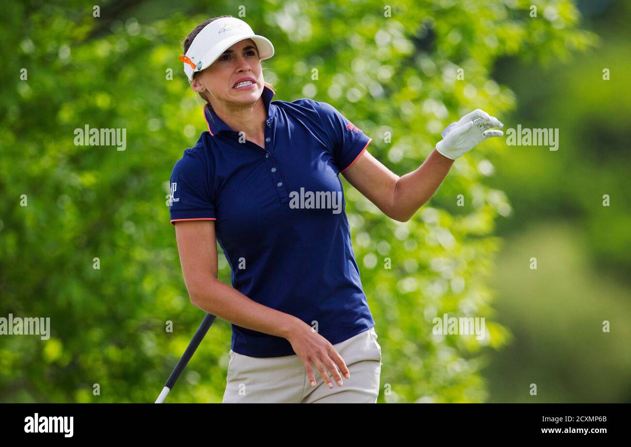 Belen Mozo of Spain reacts after teeing off on eighth hole during the second round of the Manulife Financial LPGA Classic women's golf tournament at the Grey Silo course in Waterloo, June 6, 2014.    REUTERS/Mark Blinch (CANADA - Tags: SPORT GOLF) Stock Photo