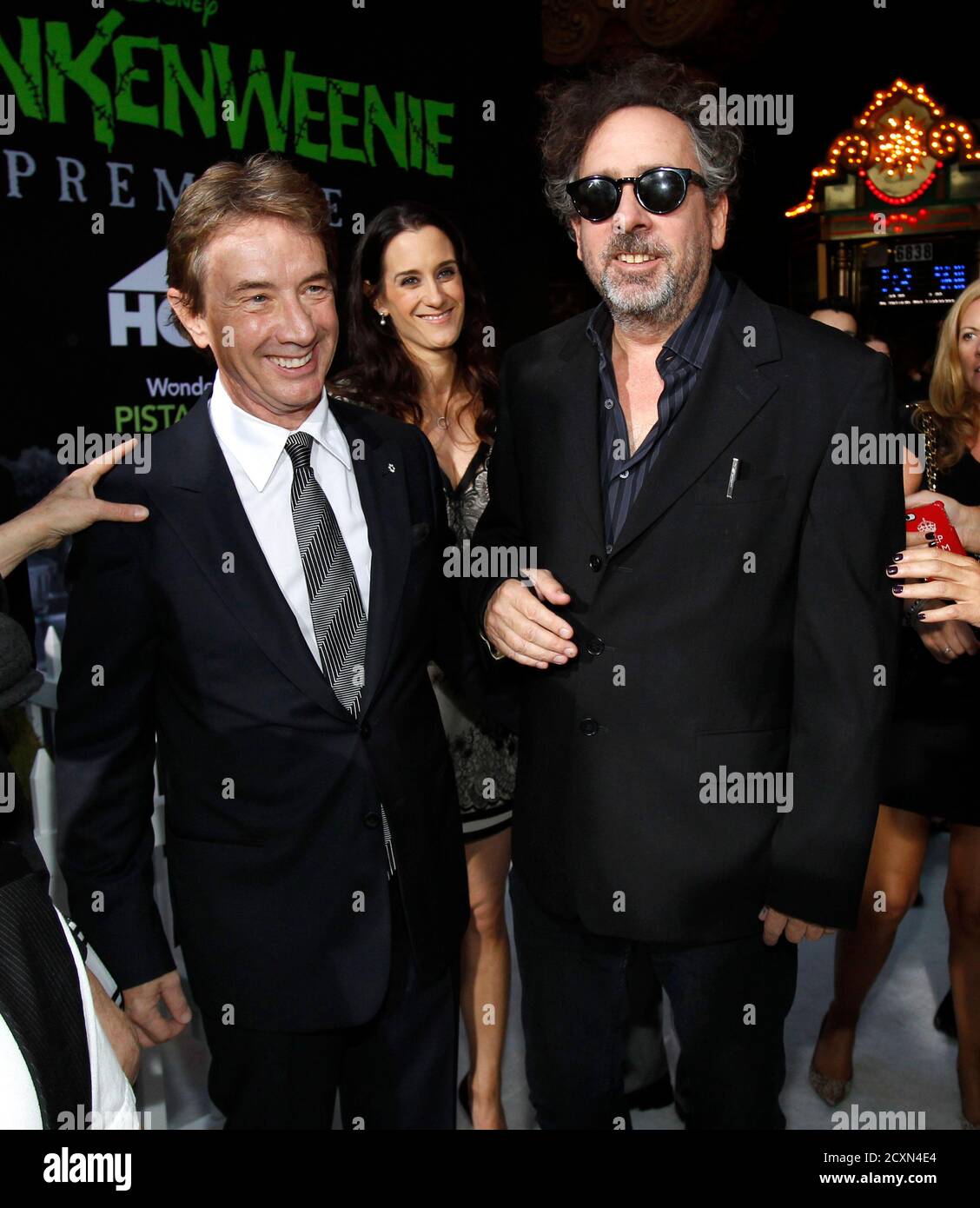 Director and producer Tim Burton (R) poses with cast member Martin Short at  the premiere of "Frankenweenie" at El Capitan theatre in Hollywood,  California September 24, 2012. The movie opens in the