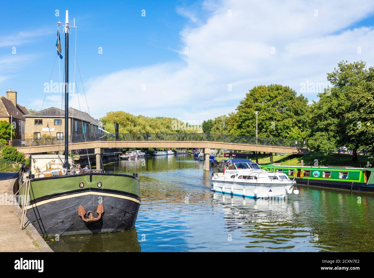 Boats on the River great Ouse and the Babylon bridge over the river Great Ouse Ely Cambridgeshire England UK GB Europe Stock Photo