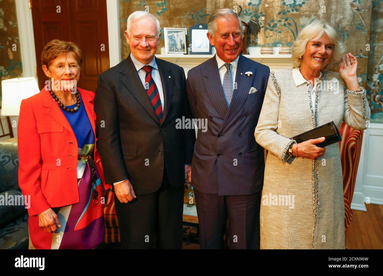 britains-prince-charles-and-camilla-duchess-of-cornwall-meet-the-governor-general-of-canada-david-johnson-2nd-l-and-his-wife-sharon-l-after-arriving-in-halifax-nova-scotia-may-18-2014-the-royal-couple-are-on-a-four-day-visit-to-canada-that-begins-in-halifax-and-includes-stops-in-pictou-nova-scotia-the-prince-edward-island-towns-of-charlottetown-bonshaw-and-cornwall-and-concludes-in-winnipeg-reutersmark-blinch-canada-tags-royals-society-entertainment-2CXN96W.jpg