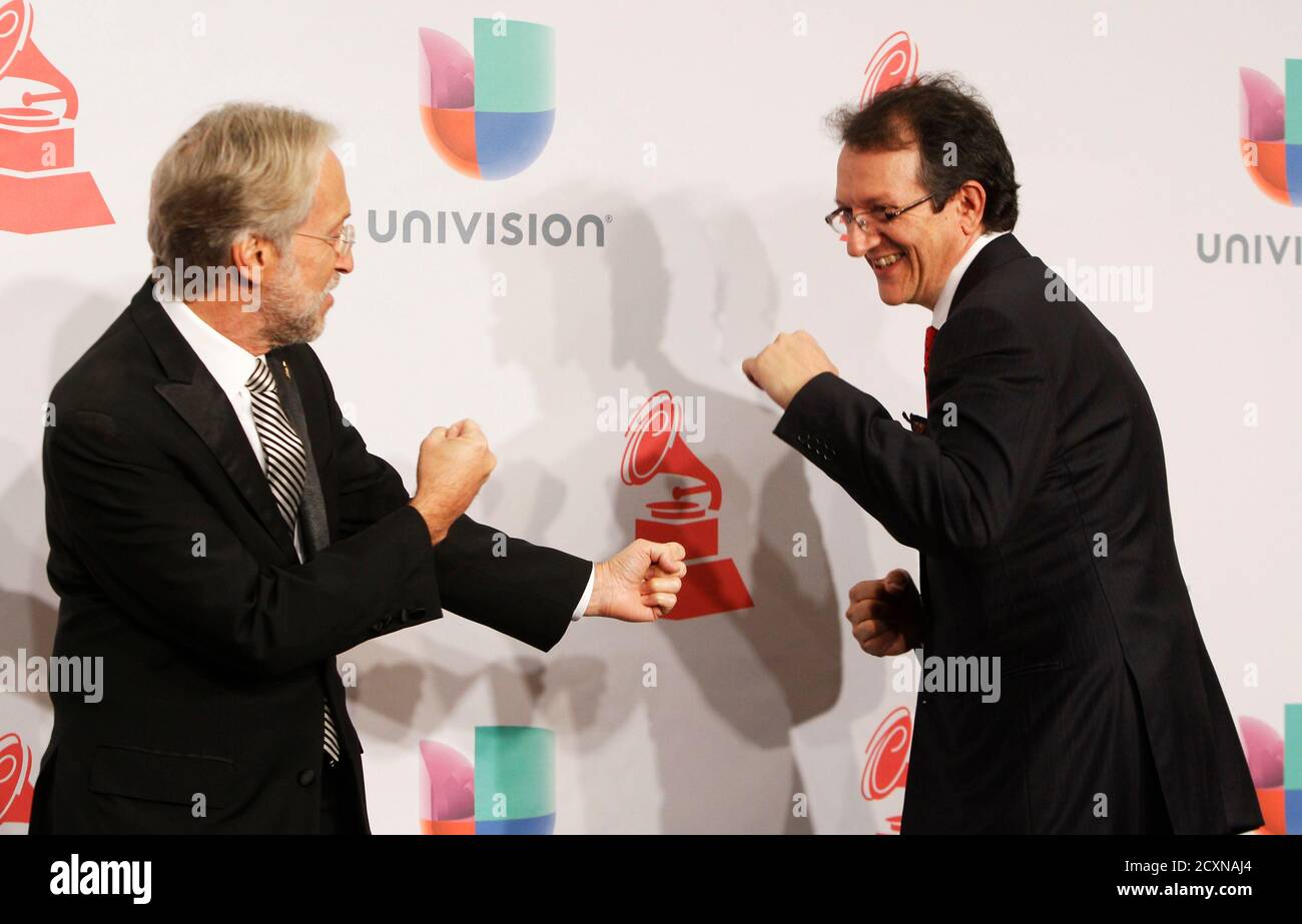 President and CEO of the National Academy of Recording Arts and Sciences Neil Portnow (L) and President and CEO of the Latin Academy of Recording Arts and Sciences Gabriel Abaroa Jr., play fight backstage during the 15th Annual Latin Grammy Awards in Las Vegas, Nevada November 20, 2014. REUTERS/Steve Marcus (UNITED STATES-Tags: ENTERTAINMENT)(MUSIC-LATINGRAMMY-BACKSTAGE) Stock Photo