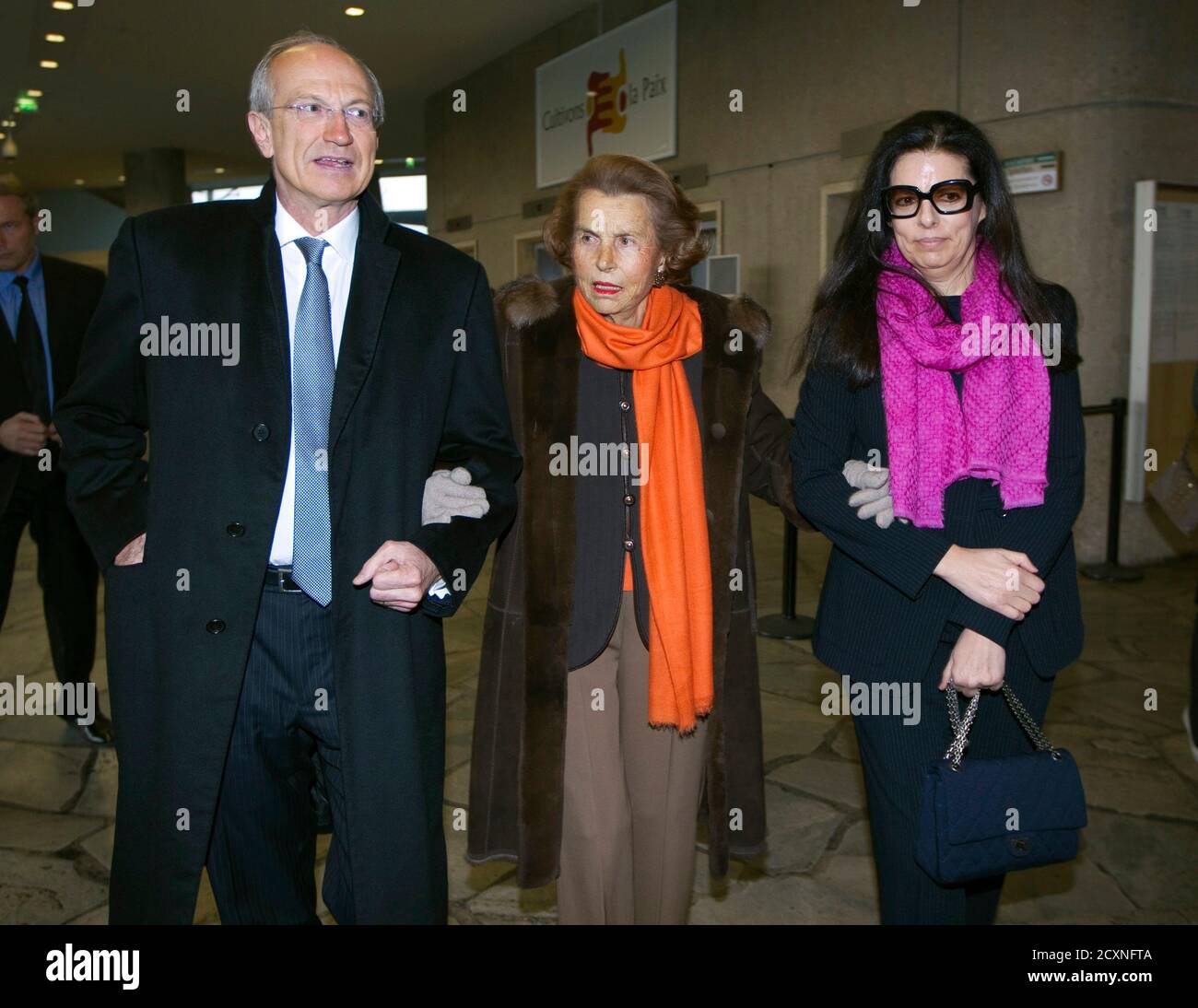 L-R) Cosmetics company L'Oreal chief executive Jean-Paul Agon, Liliane  Bettencourt, heiress to the L'Oreal fortune and her daughter Francoise  Bettencourt Meyers arrive for the L'Oreal-UNESCO prize for women in Paris,  March 3,