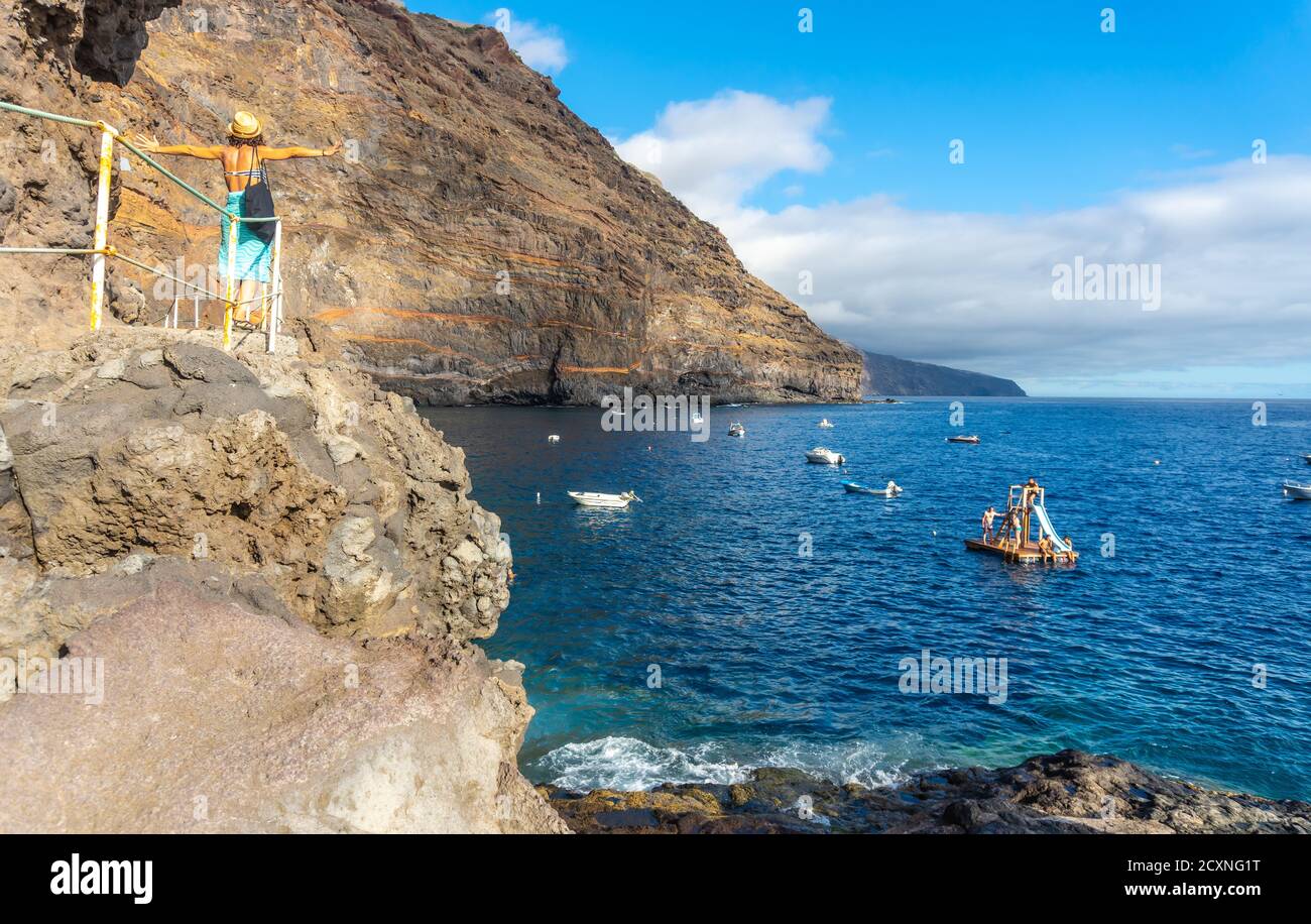 Young tourist enjoying the cove of Puerto de Puntagorda, Canary Islands, Spain Stock Photo