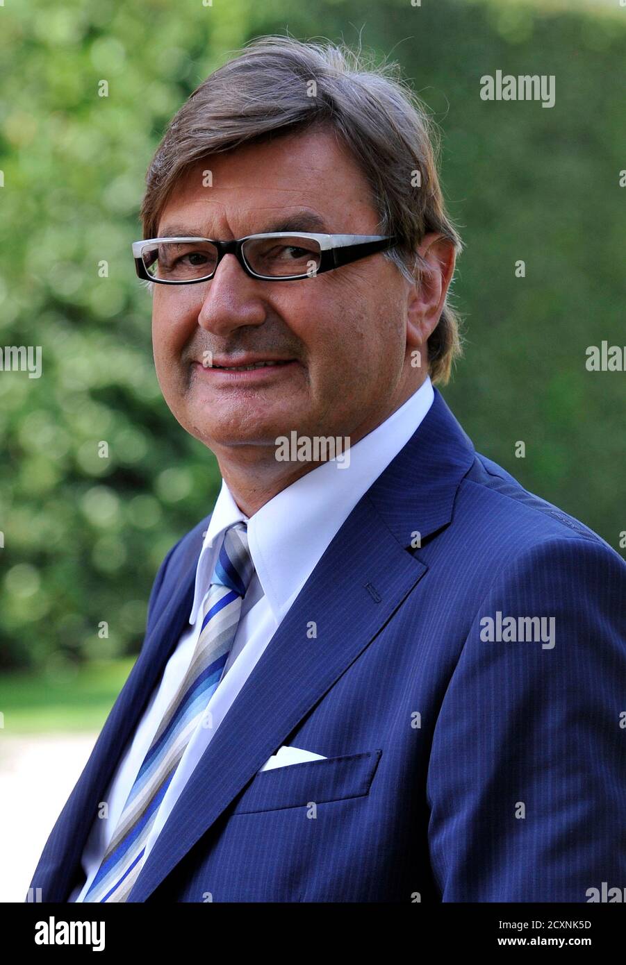 Geox President Mario Moretti Polegato is pictured during the Ambrosetti  workshop, an economic conference, in Cernobbio, next to Como, September 8,  2012. REUTERS/Paolo Bona (ITALY - Tags: BUSINESS POLITICS Stock Photo -  Alamy