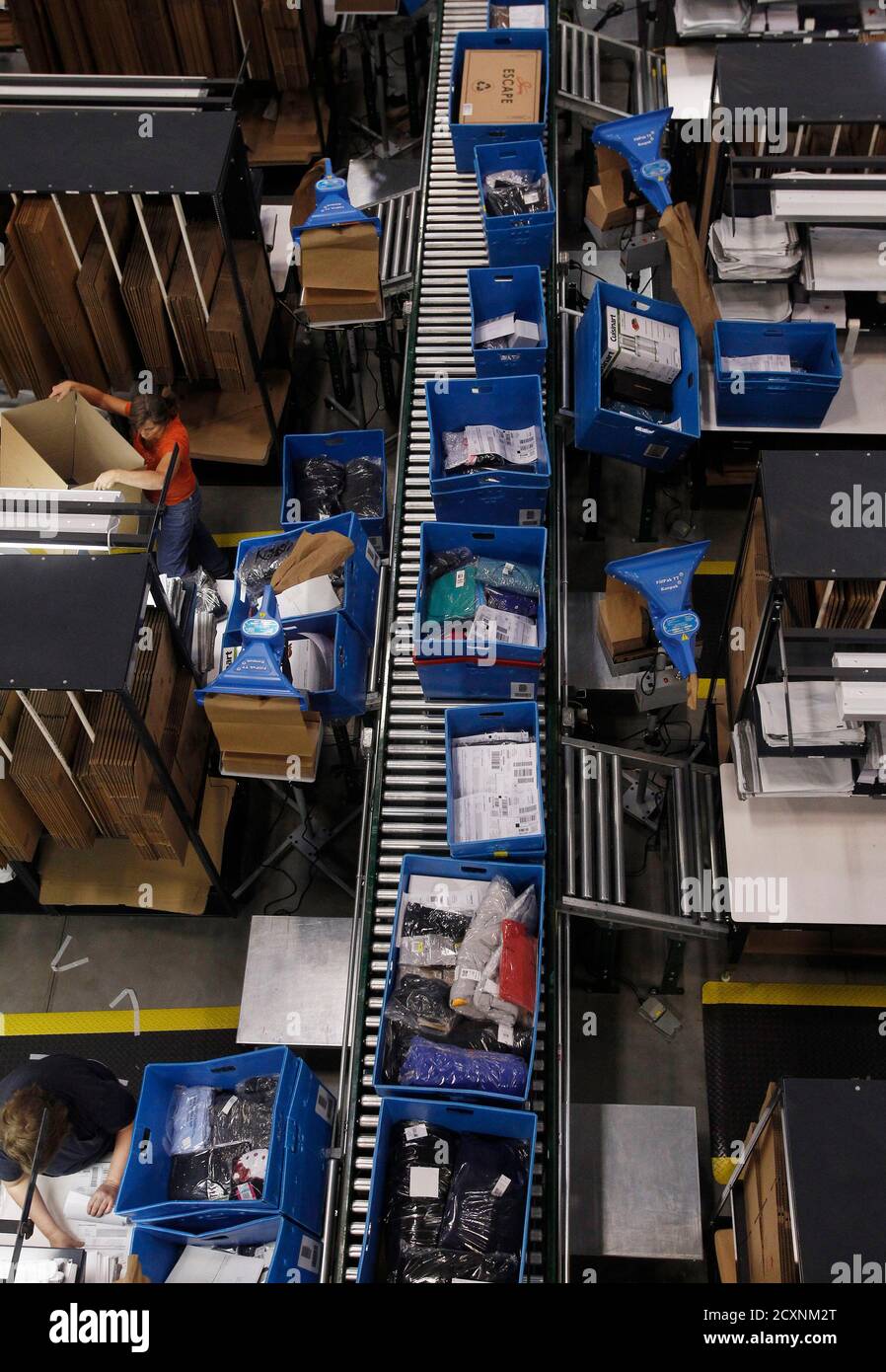 Associate Packers L Fill Orders At The Macy S Bloomingdale S Fulfillment Center In Martinsburg West Virginia December 6 2012 Reuters Gary Cameron United States Tags Business Stock Photo Alamy