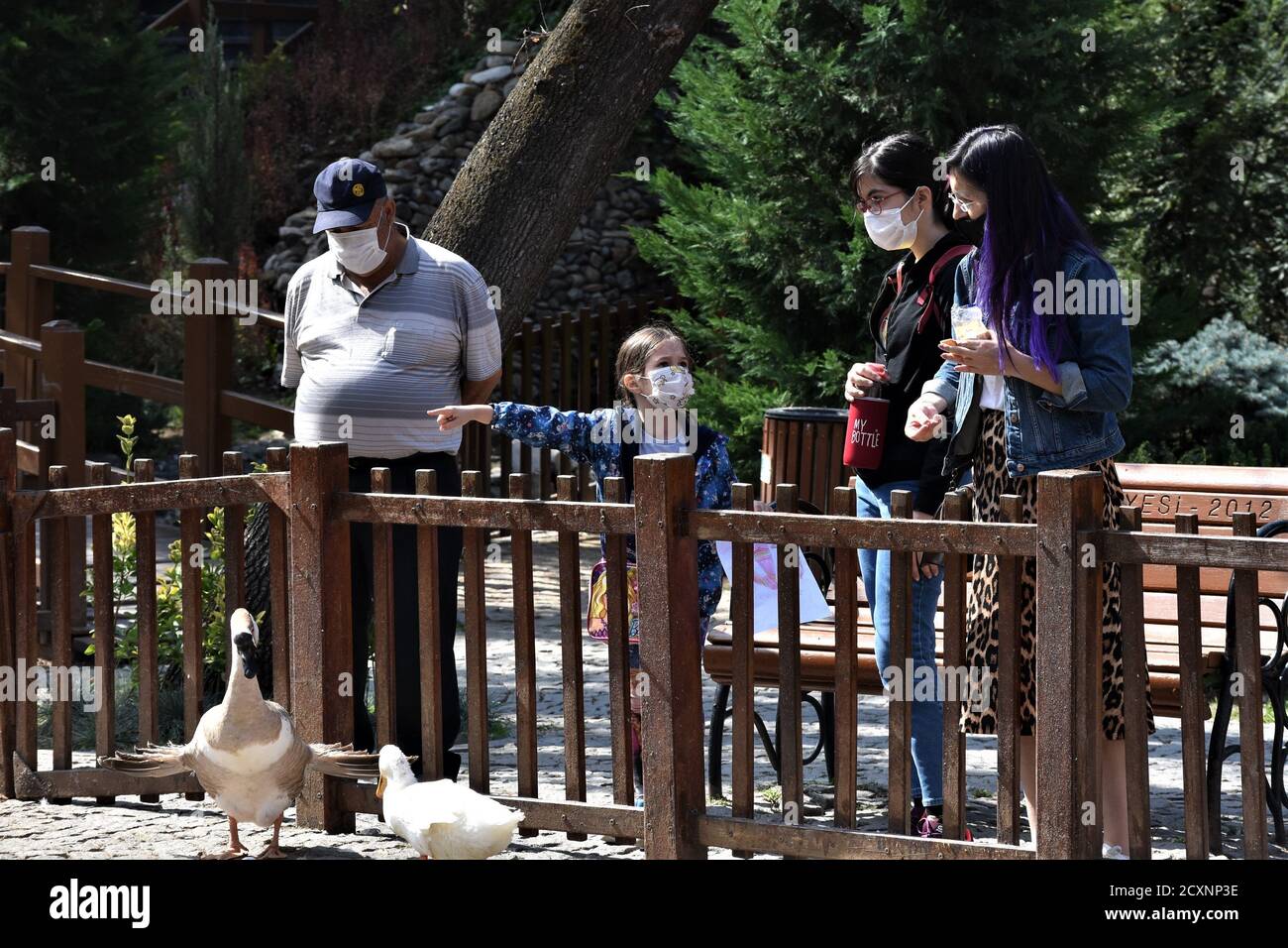 Ankara, Turkey. 1st Oct, 2020. People wearing protective face masks enjoy a nice weather in Kugulu Park amid the coronavirus (COVID-19) outbreak. Turkish Minister of Health Fahrettin Koca admitted on September 30 that asymptomatic cases of the coronavirus are deliberately excluded from daily reports. The minister's statement came after the revelation of a document showing nearly 20 times more cases than the official daily figures. Credit: Altan Gocher/ZUMA Wire/Alamy Live News Stock Photo