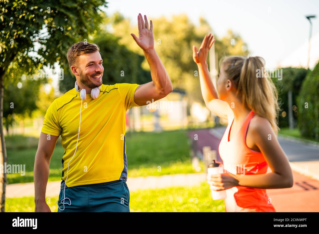 Young happy couple is ready for exercising outdoor Stock Photo Alamy