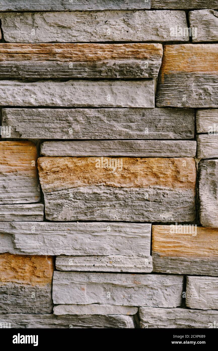 Facing stone Tanvald. Wall of decorative-facing stone Stock Photo