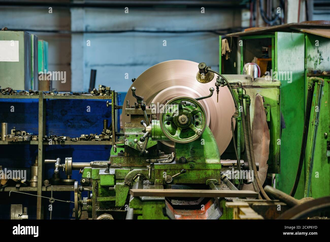Working green lathe in the metalworking Stock Photo Alamy