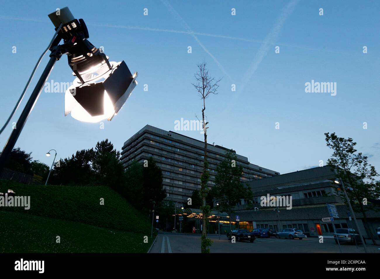 A television light stands in front of the University Hospital of Lausanne  (CHUV) in Lausanne June 16, 2014. Seven times Formula One racing champion  Michael Schumacher, who suffered severe head injuries in