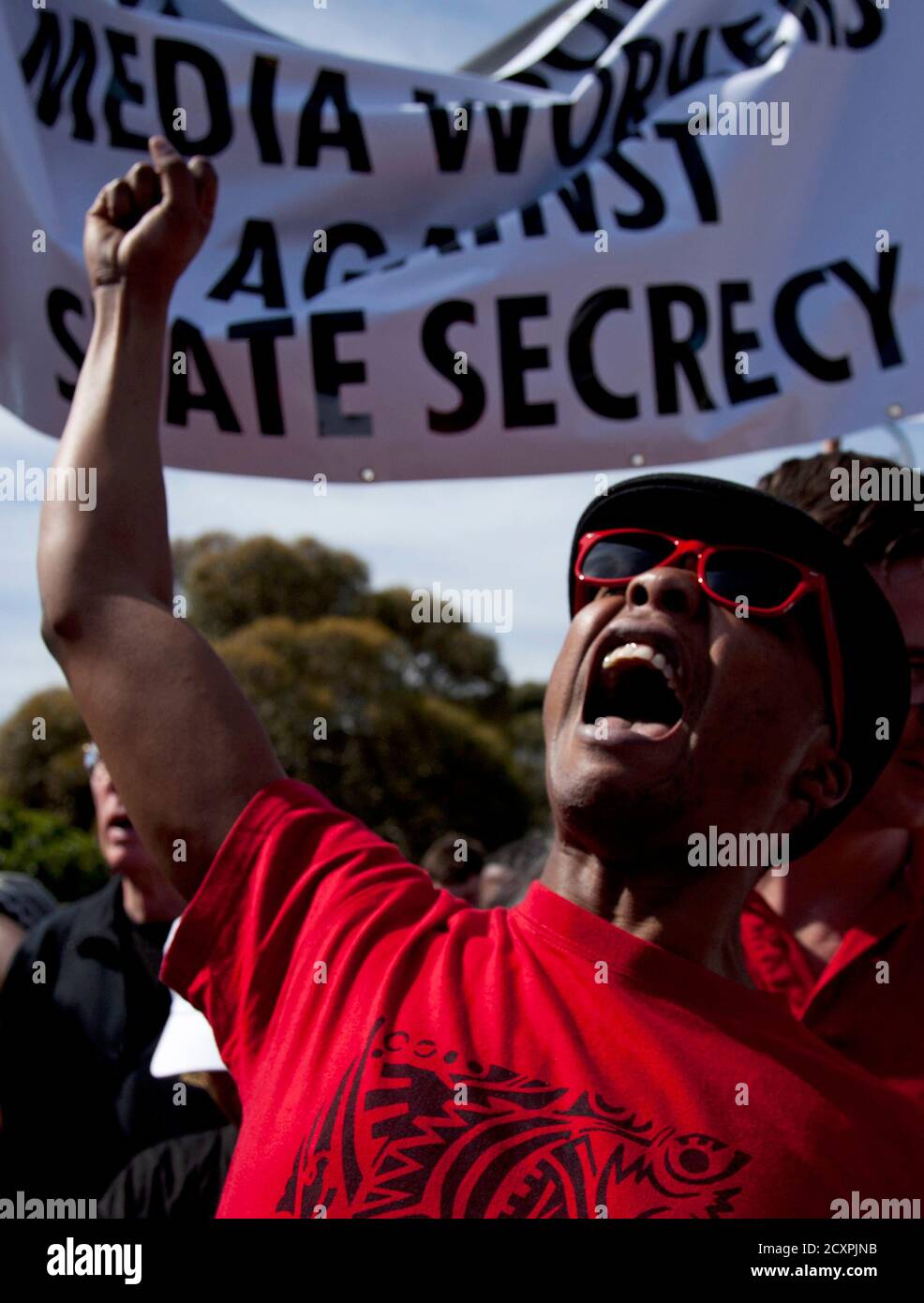 Protesters take part in a demonstration against the Protection of Information Bill in Cape Town September 17, 2011. South Africa's parliament is expected to pass shortly a much criticised state secrecy bill after removing provisions giving agencies broad power to keep information hidden and draconian penalties that critics likened to apartheid-era laws. Introduced by the Ministry of State Security in 2010, the draft law spooked investors worried that government agencies would hide from public view market-sensitive information, as well as journalists who faced up to 25 years in jail for illegal Stock Photo