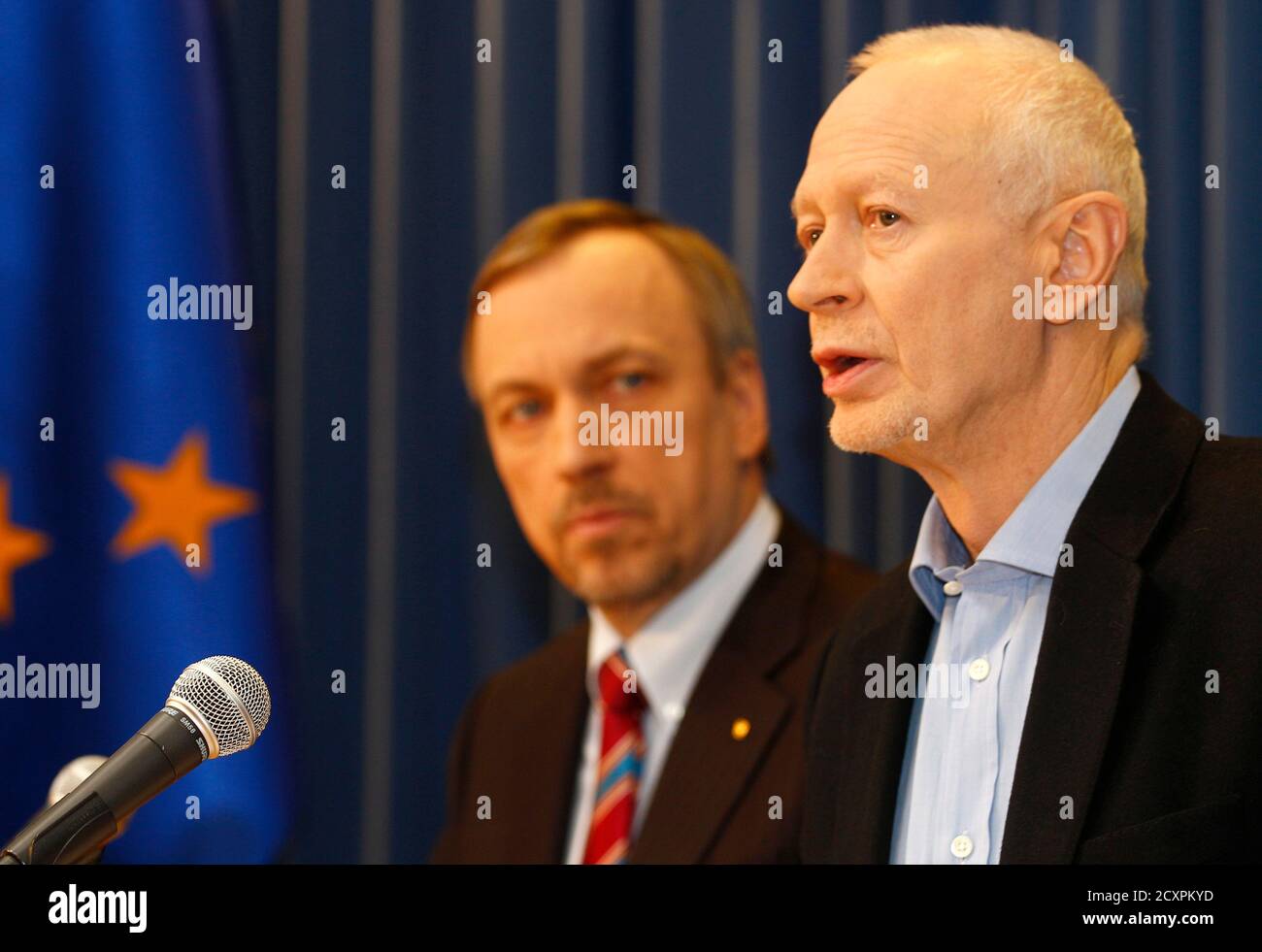 Poland's Minister of Culture Bogdan Zdrojewski and Government Minister Michal Boni (R) speak to the media at a news conference regarding the hackers attack on government websites at the Prime Ministers Chancellery in Warsaw January 23, 2012. Hackers from the Anonymous group blocked numerous websites of Polish authorities on Saturday, barring access to the internet sites of the parliament, the Prime Minister and the President to protest against Warsaw's plans of signing the ACTA agreement that aims to protect intellectual rights, Rzeczpospolita daily reported. REUTERS/Peter Andrews (POLAND - Ta Stock Photo