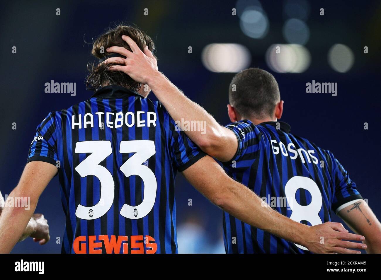 Hans Hateboer of Atalanta (L) celebrates with Robin Gosens (R) after scoring 0-2 goal during the Italian championship Serie A football match between SS Lazio and Atalanta BC on September 30, 2020
